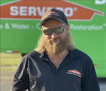 White male, wearing sunglasses.